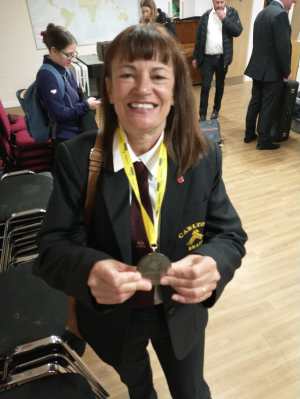 Lynda with her medal
